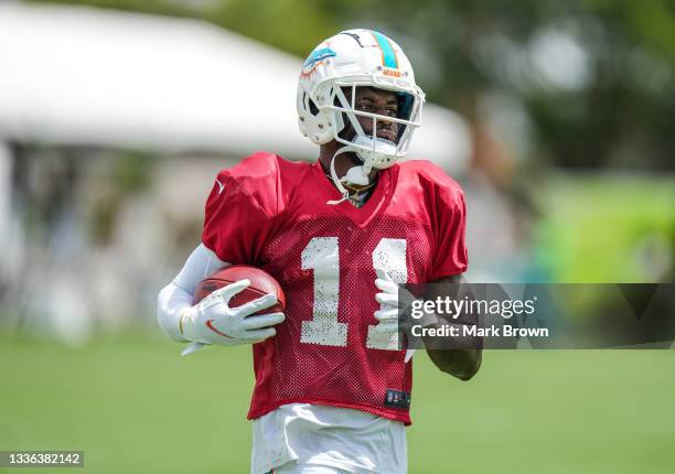 Wide Receiver DeVante Parker of the Miami Dolphins performs practice drills during Training Camp at Baptist Health Training Complex on August 25,...