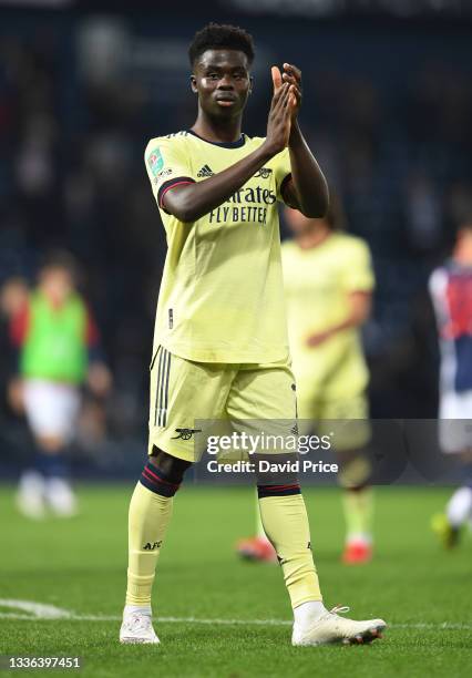 Bukayo Saka of Arsenal claps the fans after the Carabao Cup second round match between West Bromwich Albion and Arsenal at The Hawthorns on August...