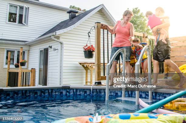 65 Woman Pushing Man Into Swimming Pool Stock Photos, High-Res Pictures ...