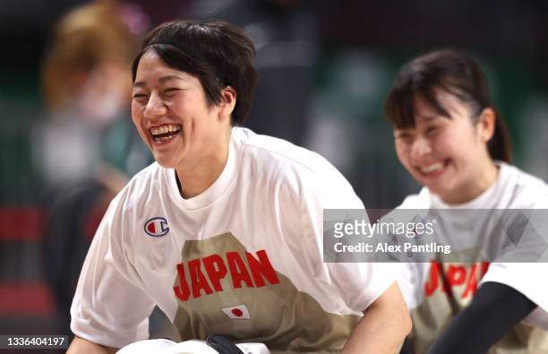 Yui Kitama and Rie Odajima of Team Japan share a joke during the Wheelchair Basketball Women's preliminary round group A match between team Japan and...