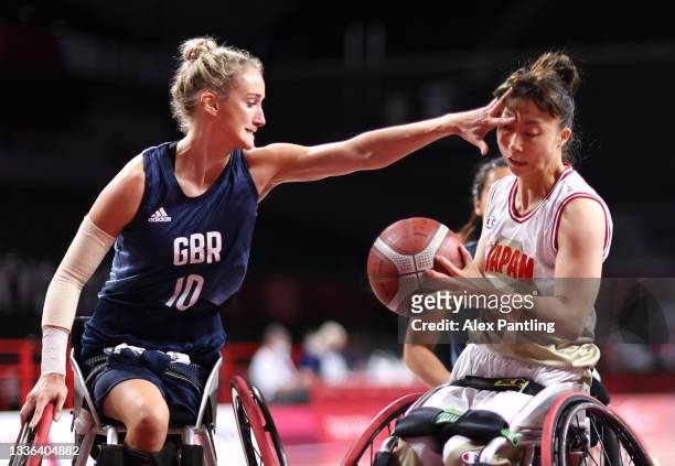 Amy Conroy of Team Great Britain fouls Mari Amimoto of Team Japan during the Wheelchair Basketball Women's preliminary round group A match between...