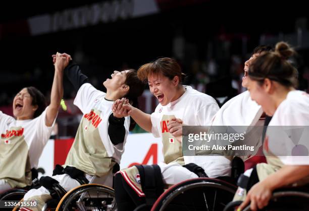 Team Japan celebrate victory during the Wheelchair Basketball Women's preliminary round group A match between team Japan and team Great Britain at...
