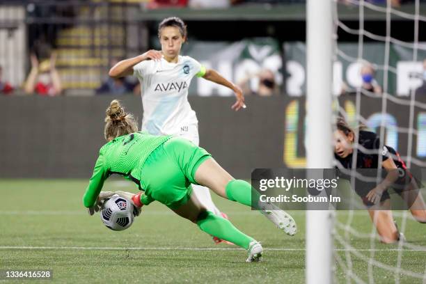 Bella Bixby of the Portland Thorns FC makes a save on a shot by Carli Lloyd of the NJ/NY Gotham FC at Providence Park on August 25, 2021 in Portland,...