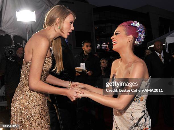 Singers Taylor Swift and Katy Perry arrive at the 2011 American Music Awards held at Nokia Theatre L.A. LIVE on November 20, 2011 in Los Angeles,...