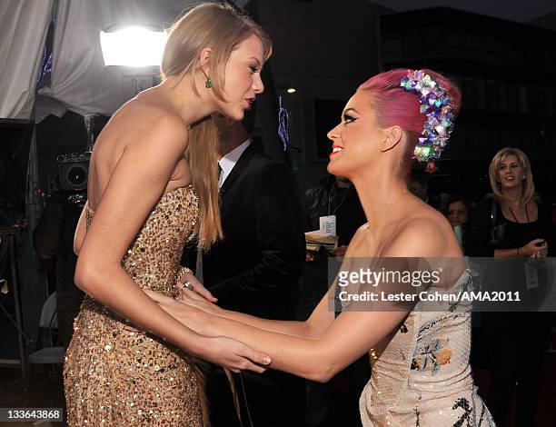 Singers Taylor Swift and Katy Perry arrive at the 2011 American Music Awards held at Nokia Theatre L.A. LIVE on November 20, 2011 in Los Angeles,...