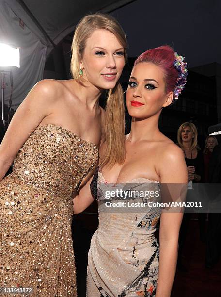 Singers Taylor Swift and Katy Perry arrive at the 2011 American Music Awards held at Nokia Theatre L.A. LIVE on November 20, 2011 in Los Angeles,...