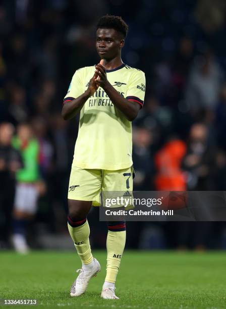 Bukayo Saka of Arsenal applauds the fans after the Carabao Cup Second Round between West Bromwich Albion and Arsenal at The Hawthorns on August 25,...