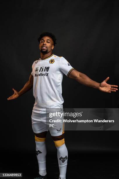 Adama Traore of Wolverhampton Wanderers poses for a portrait in the Wolverhampton Wanderers 2021/22 Third Kit at Molineux on August 03, 2021 in...