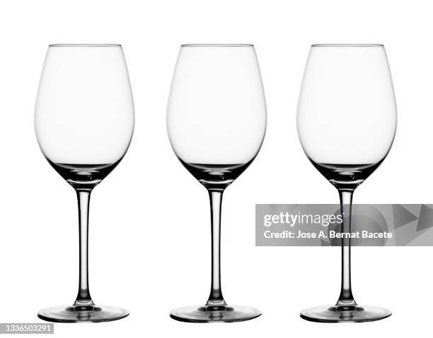 silhouette of three empty wine glasses on a white background. - wijnglas stockfoto's en -beelden