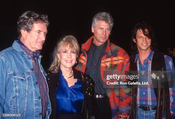 View of, from left, actors Hugh O'Brian, Barbara Eden, Barry Bostwick, and Jimmy McNichol as they attend an 'Under Western Stars' screening at Warner...