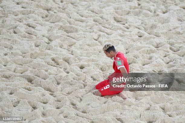 Heirauarii Salem of Tahiti looks dejected following defeat in the FIFA Beach Soccer World Cup 2021 Quarter-final match between Tahiti and Japan at...