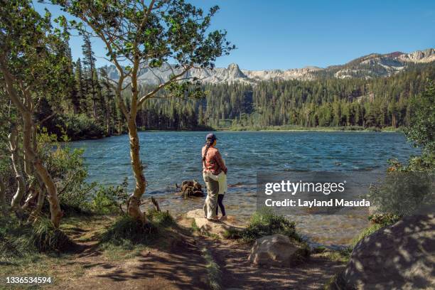 mom and daughter at mountain lake - mammoth lakes stock pictures, royalty-free photos & images