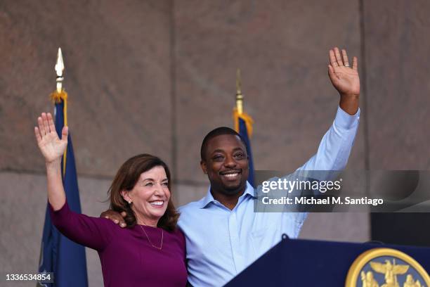 New York Gov. Kathy Hochul and State Senator Brian Benjamin wave at the crowd during a press conference announcing him as her Lt. Governor on August...