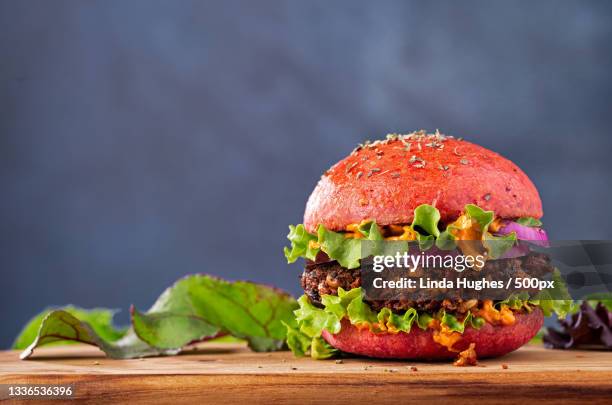 close-up of burger on table,manassas,virginia,united states,usa - nobody burger colour image not illustration stock pictures, royalty-free photos & images