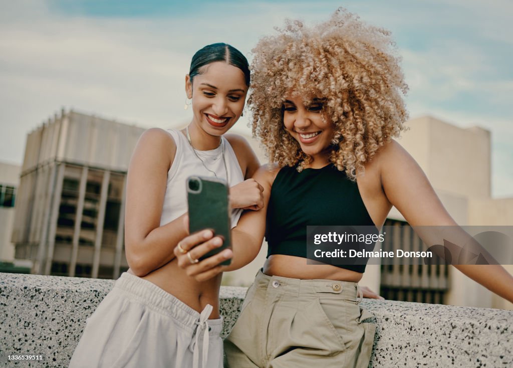 Shot of two beautiful young women taking a selfie together