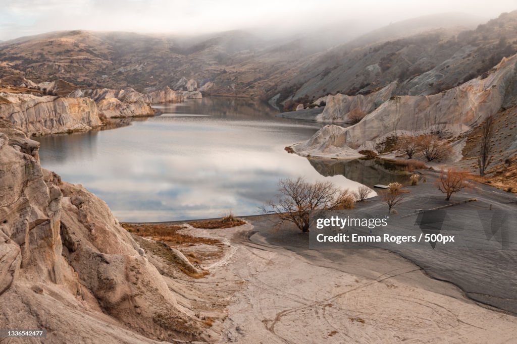 Scenic view of lake and mountains against sky,Blue Lake,Otago,New Zealand