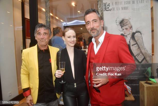 Editor Luigi di Donna, model Sonia Gleis and Greg Verlet from "Champagne Verlet by Greg" attend "Le Petit Echo De L'Art Et De La Mode" Auction Party...