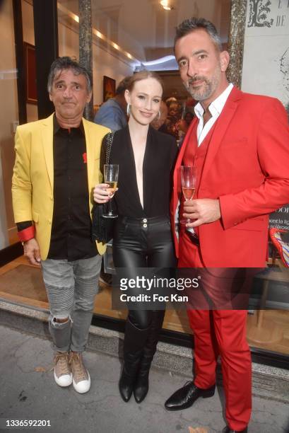 Editor Luigi di Donna, model Sonia Gleis and Greg Verlet from "Champagne Verlet by Greg" attend "Le Petit Echo De L'Art Et De La Mode" Auction Party...