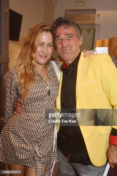 Actress Myriam Charleins and editor Luigi di Donna attend "Le Petit Echo De L'Art Et De La Mode" Auction Party At 12 ND Nazareth on August 26, 2021...