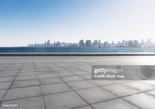 parking lot by the sea - bare beach stock pictures, royalty-free photos & images