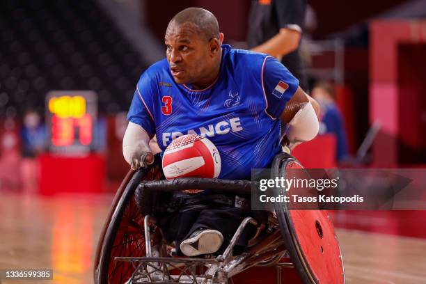 Cedric Nankin of Team France fights for the ball against Team Denmark during group A wheelchair rugby match one, on day 3 of the Tokyo 2020...