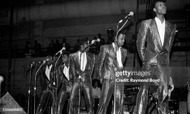 Singers Bobby Brown , Ricky Bell , Ralph Tresvant , Michael Bivins and Ronnie DeVoe of New Edition performs at the U.I.C. Pavilion in Chicago,...