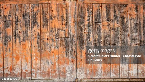 weathered painting on a textured wooden door in paris - wood rot stock pictures, royalty-free photos & images