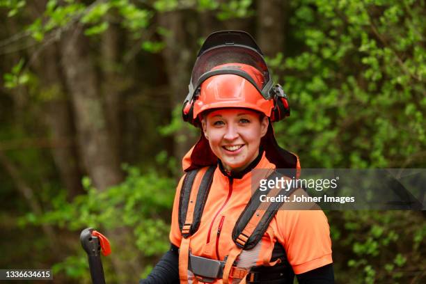 portrait of female lumberjack - skogshuggare bildbanksfoton och bilder