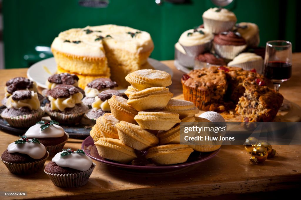 Selection of homemade rustic baked goods such as sweet pies and cupcakes