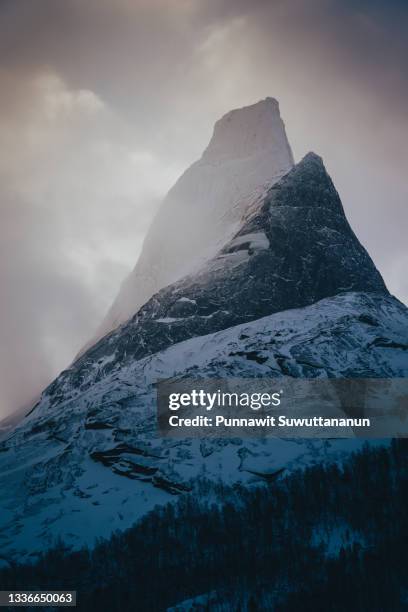 stetind, norway's national mountain in a beautiful morning sunrise in winter season, norway, scandinavia - sharp stock pictures, royalty-free photos & images