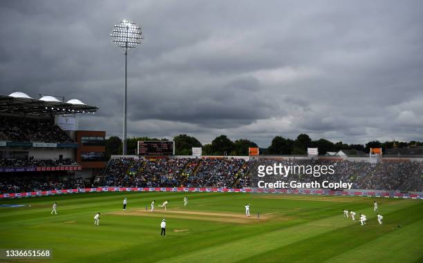 General view as James Anderson of England bowls under dark skies during day three of the Third LV= Insurance Test Match between England and India at...