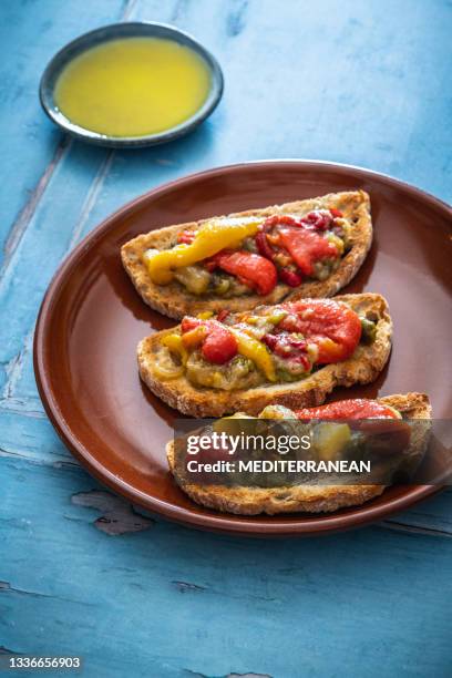 escalivada a mediterranean recipe with roasted vegetables and olive oil on a roasted bread slice - catalani stock pictures, royalty-free photos & images