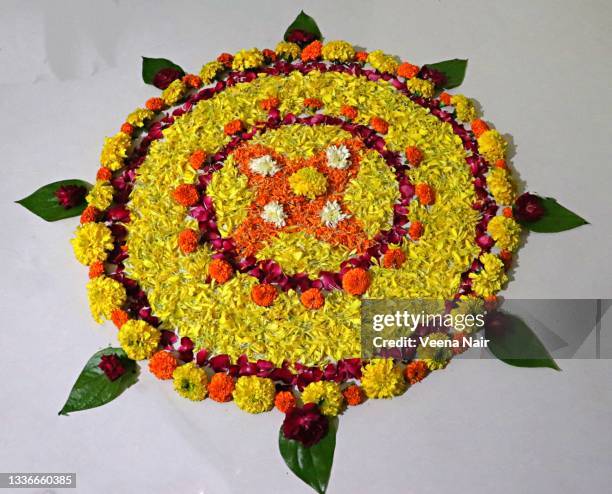 onam pookalam/flower rangoli/floral pattern/onam festival/kerala - pookalam stock pictures, royalty-free photos & images