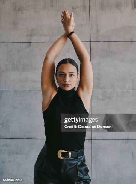 shot of a young businesswoman at work - female armpits imagens e fotografias de stock