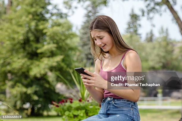 teenage girl texting - cute 15 year old girls stock pictures, royalty-free photos & images