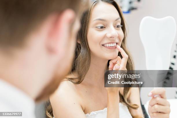 dentist with patient. - implante dentário imagens e fotografias de stock