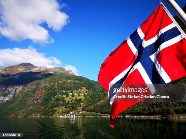 norway mountains at the geirangerfjord - norway flag stock pictures, royalty-free photos & images