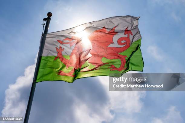 Close-up of a Wales flag against a blue sky on July 26, 2021 in Cardiff, Wales.