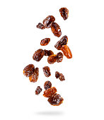 Delicious raisin in the air isolated on white background