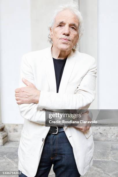 Abel Ferrara poses for photographer after the reading of the writer/poet Gabriele Tinti poems at Pinacoteca di Brera on August 27, 2021 in Milan,...