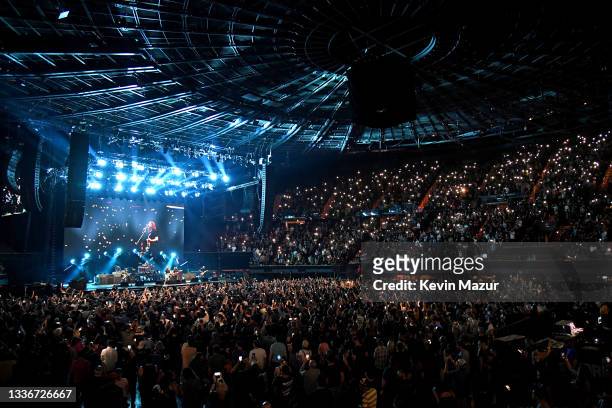 Chris Shiflett, Rami Jaffee, Dave Grohl, Taylor Hawkins, Nate Mendel, and Pat Smear of Foo Fighters perform onstage at The Forum on August 26, 2021...