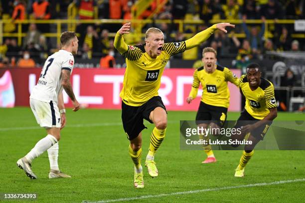 Erling Haaland of Borussia Dortmund celebrates after scoring their side's third goal during the Bundesliga match between Borussia Dortmund and TSG...
