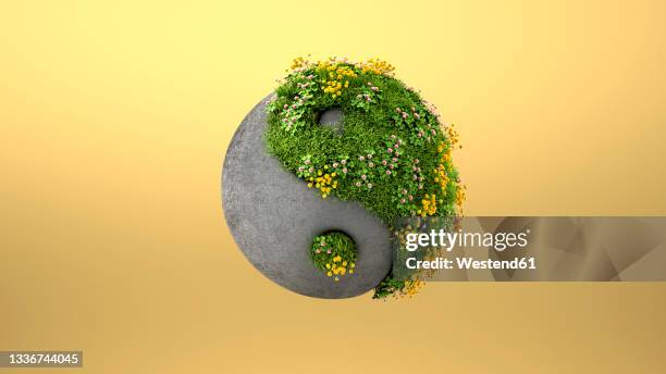 three dimensional render of yin and yang symbol made of concrete and springtime meadow - yin yang symbol stock illustrations