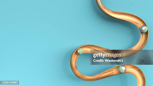 illustrations, cliparts, dessins animés et icônes de three dimensional render of three small spheres rolling down wavy wooden slide - rollup