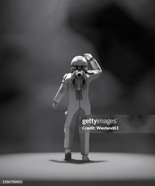 three dimensional render of astronaut standing in dusty environment - spaceman stock illustrations