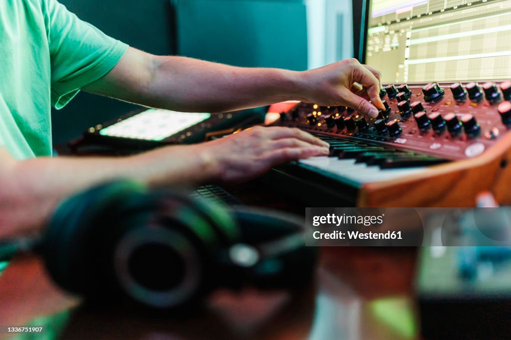 DJ working on music in studio