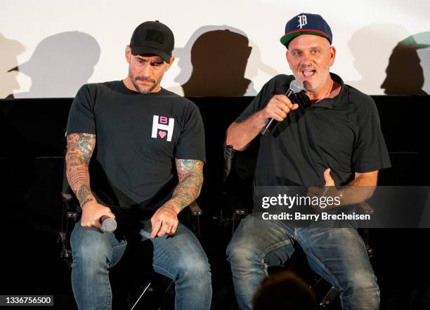 Phil Brooks “CM Punk” and Mike O’Malley talks during a screening episode of the Starz channel's wrestling drama "Heels" at the AMC River East...