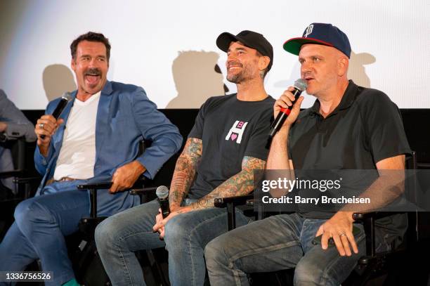 David James Elliott, Phil Brooks “CM Punk” and Mike O’Malley talks during a screening episode of the Starz channel's wrestling drama "Heels" at the...
