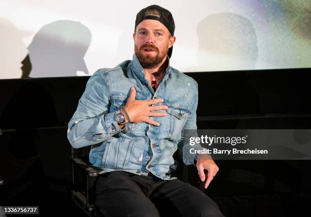 Actor Stephen Amell talks during a screening episode of the Starz channel's wrestling drama "Heels" at the AMC River East Theater, on August 26, 2021...