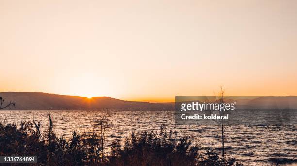 sunset above the lake - galillee stock pictures, royalty-free photos & images